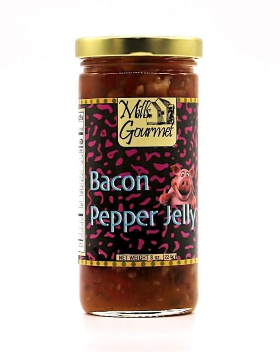 Mills Gourmet Bacon Pepper Jelly in an 8 oz jar with smoky bacon and pepper flavors, showcased on a wooden table as part of a Texas gift collection.