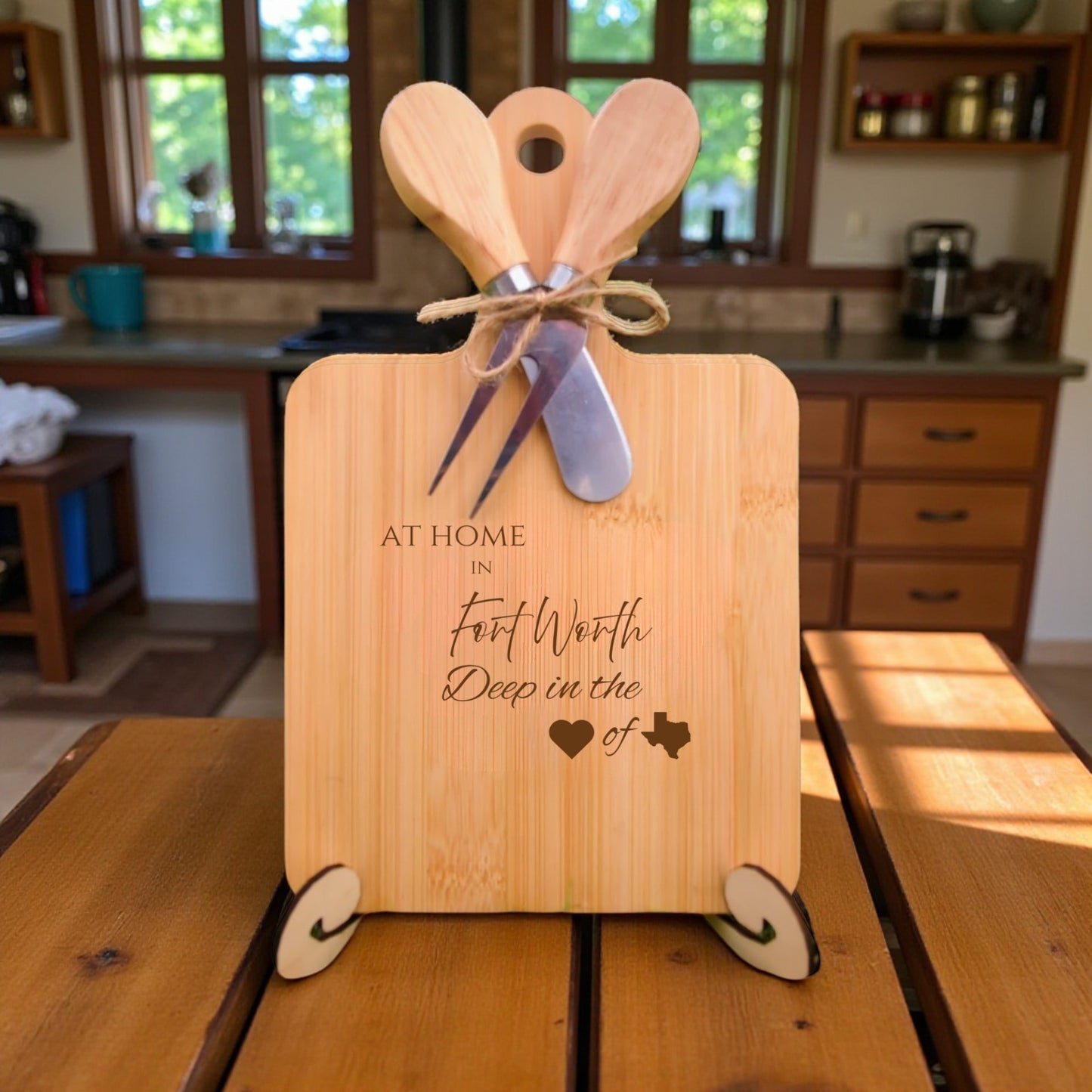 The At Home in Fort Worth Charcuterie Board with laser-engraved Texas silhouette and “At Home in Fort Worth” text, displayed in a cozy kitchen, ideal for entertaining and Texas pride.