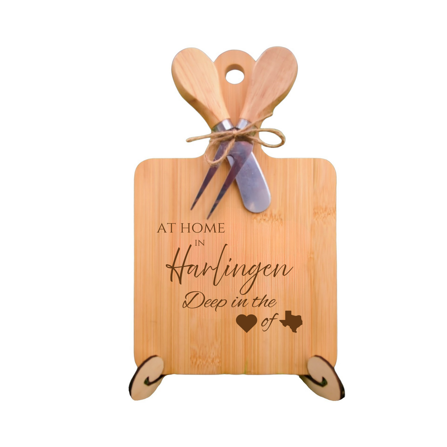 Elegant bamboo charcuterie board with utensils, engraved with “At Home in Harlingen, Deep in the Heart of Texas.”