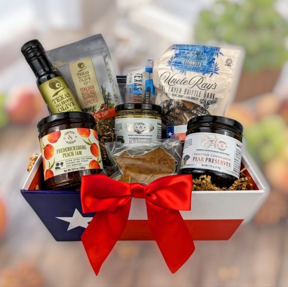 Hill Country Harvest Texas gift basket, in a Texas flag market tray, filled with Texas jam, preserves, olive oil, pecan brittle, dipping spices, and pecan praline