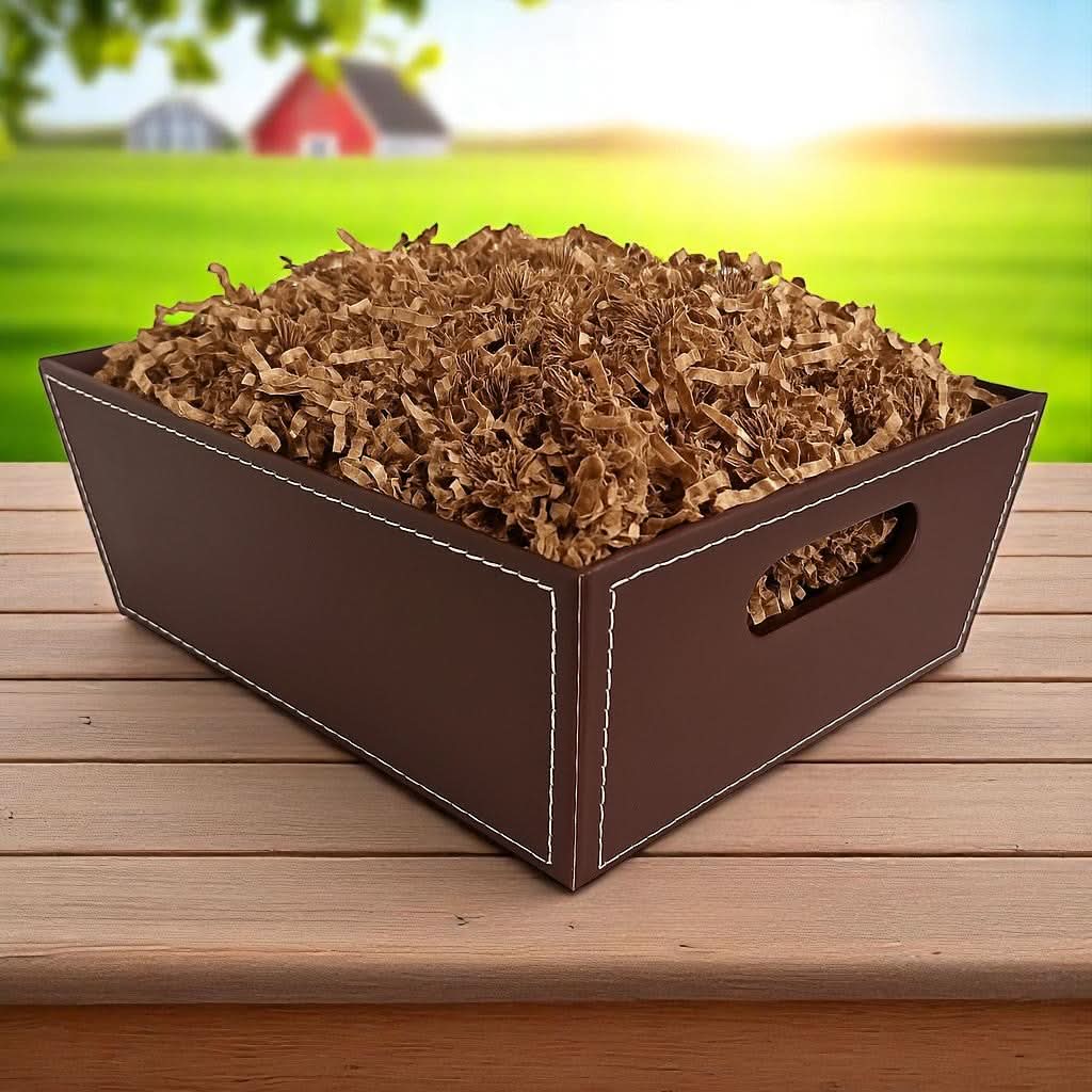 brown paperboard gift tray filled with paper shred, available to fill with Texas products and foods for a Texas gift basket