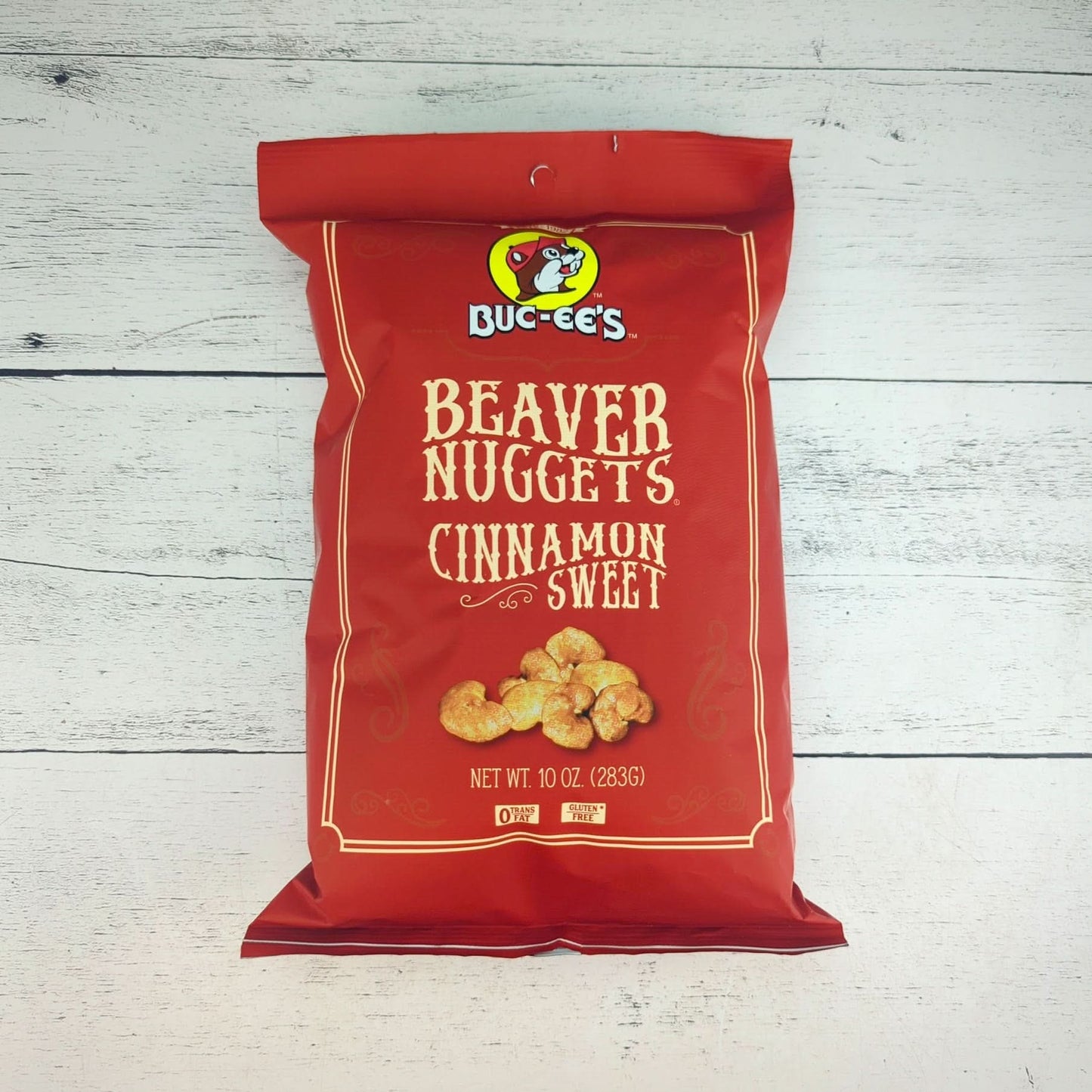 A 10-ounce package of Buc-ee’s Beaver Nuggets, cinnamon sweet flavor, for inclusion in a Texas-themed gift basket.