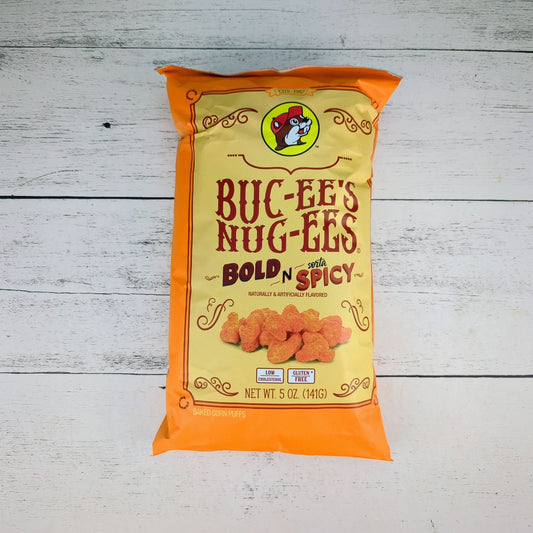 a 5oz package of bucees nugees bold n spicy, available for inclusion in a texas-themed gift basket, box, or tote