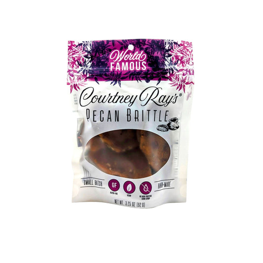 Bag of Courtney Ray’s pecan brittle with clear window, labeled gluten free and handmade