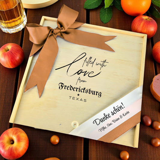 Wooden gift box with the phrase “Filled With Love from Fredericksburg,” designed for filling with customizable Texas snacks, artisan treats, and thoughtful extras.