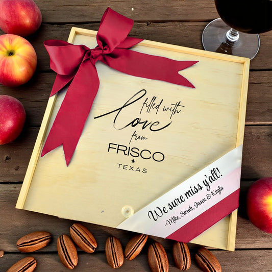 Wooden gift box with the phrase “Filled With Love from Frisco,” designed for filling with customizable Texas snacks, artisan treats, and thoughtful extras.