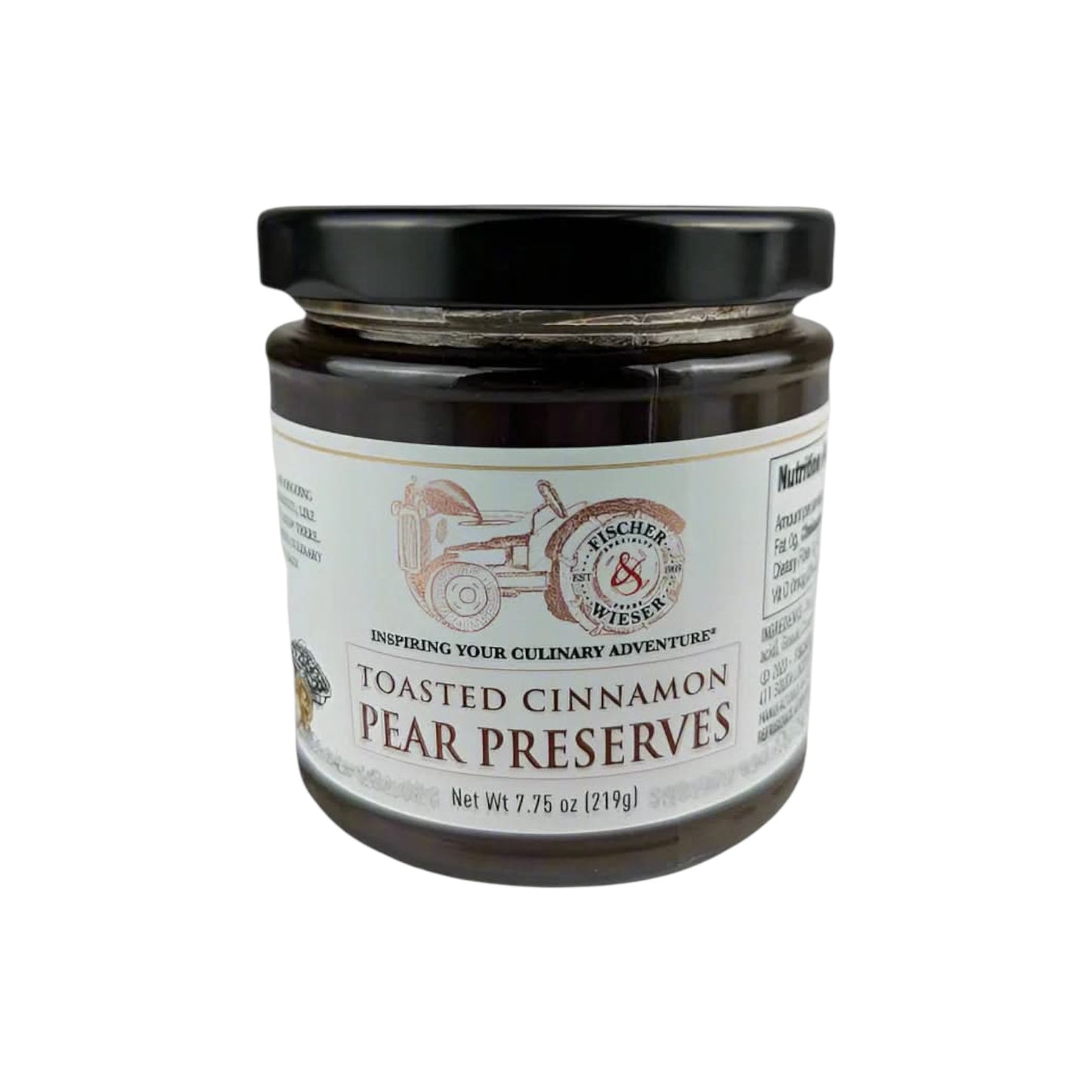 Jar of Fischer & Wieser Toasted Cinnamon Pear Preserves with a black lid and vintage-style label, filled with dark pear preserves, photographed on a white background