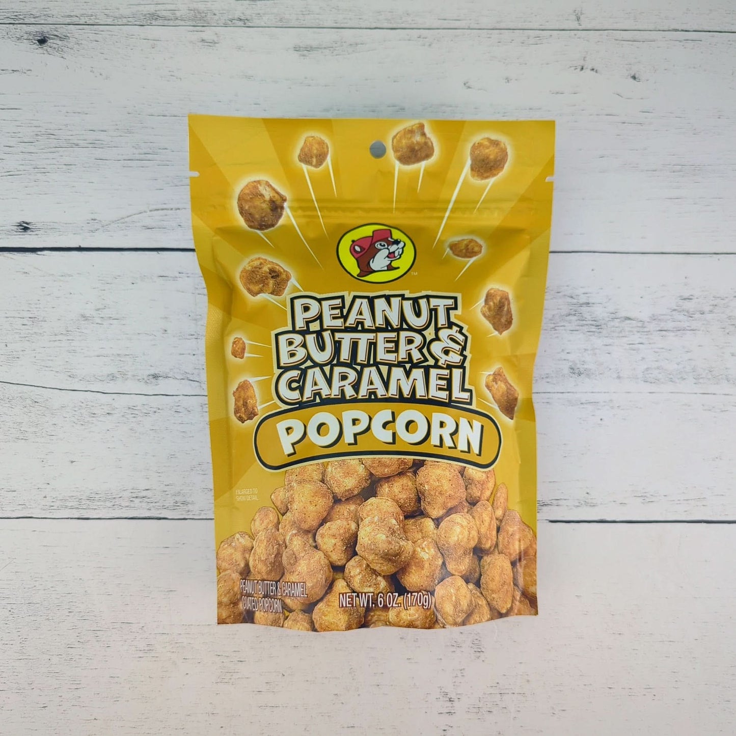 a package of bucees peanut butter and caramel popcorn