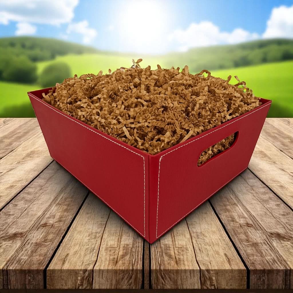 brown paperboard gift tray filled with paper shred, available to fill with Texas products and foods for a Texas gift basket