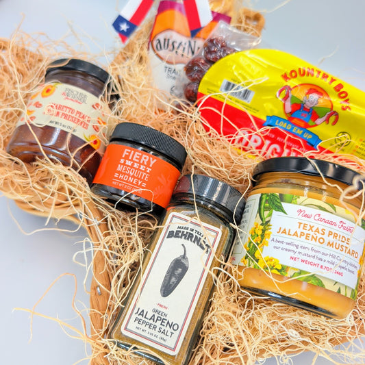 Close-up of Texas Flavor Trail’s six products in the 13-inch Texas-shaped wicker basket