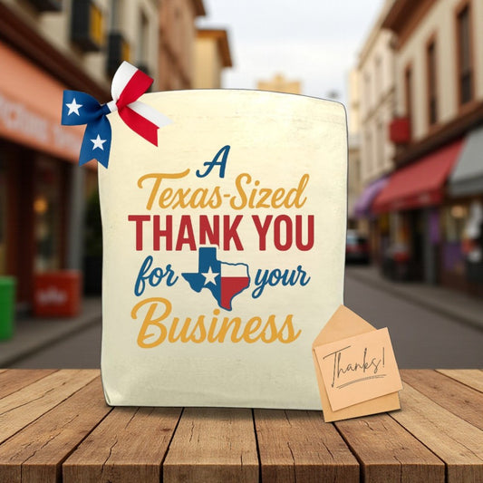 Canvas tote bag with the phrase “A Texas-Sized Thank You For Your Business,” perfect for filling with customizable Texas snacks, artisan treats, and gifts.