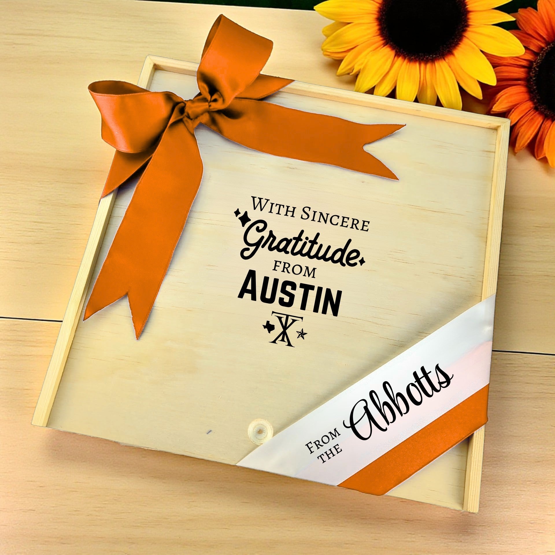 Wooden gift box with the phrase “With Sincere Gratitude from Austin,” designed for filling with customizable Texas snacks, artisan treats, and thoughtful extras.