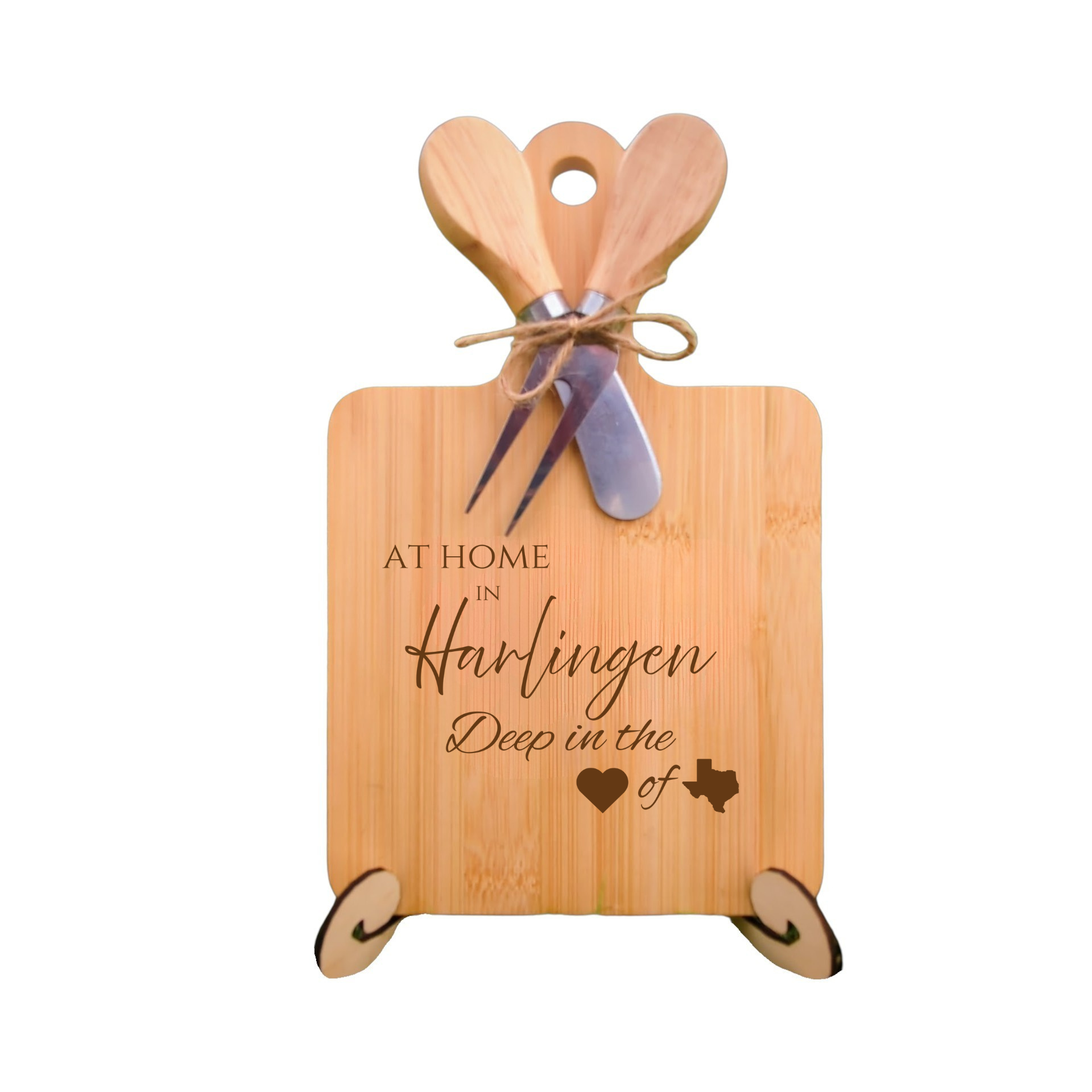 Elegant bamboo charcuterie board with utensils, engraved with “At Home in Harlingen, Deep in the Heart of Texas.”