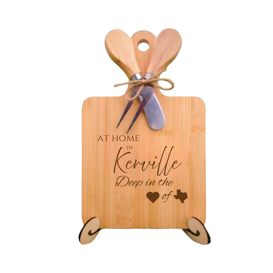 Elegant bamboo charcuterie board with utensils, engraved with “At Home in Kerrville, Deep in the Heart of Texas.”