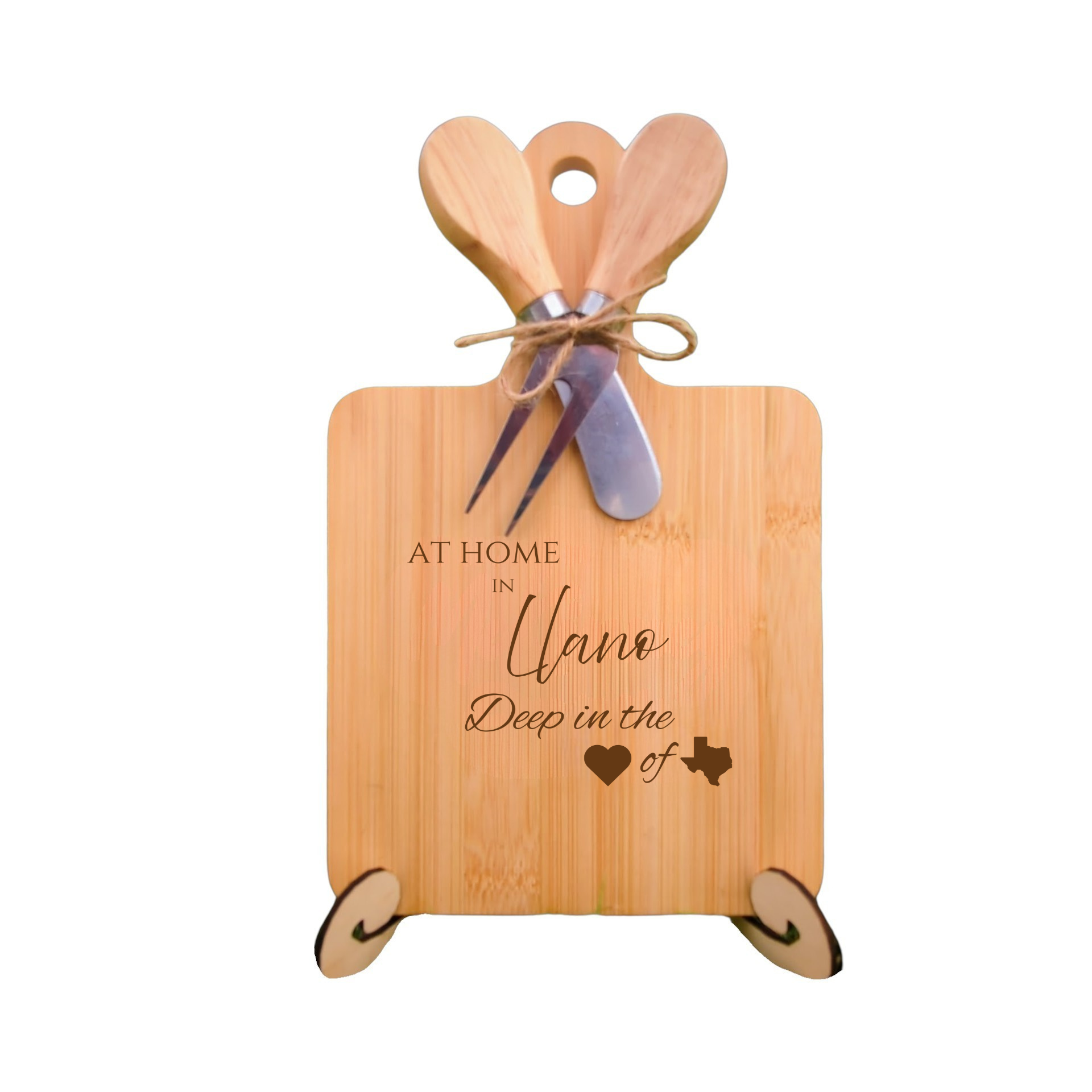 Elegant bamboo charcuterie board with utensils, engraved with “At Home in Llano, Deep in the Heart of Texas.”