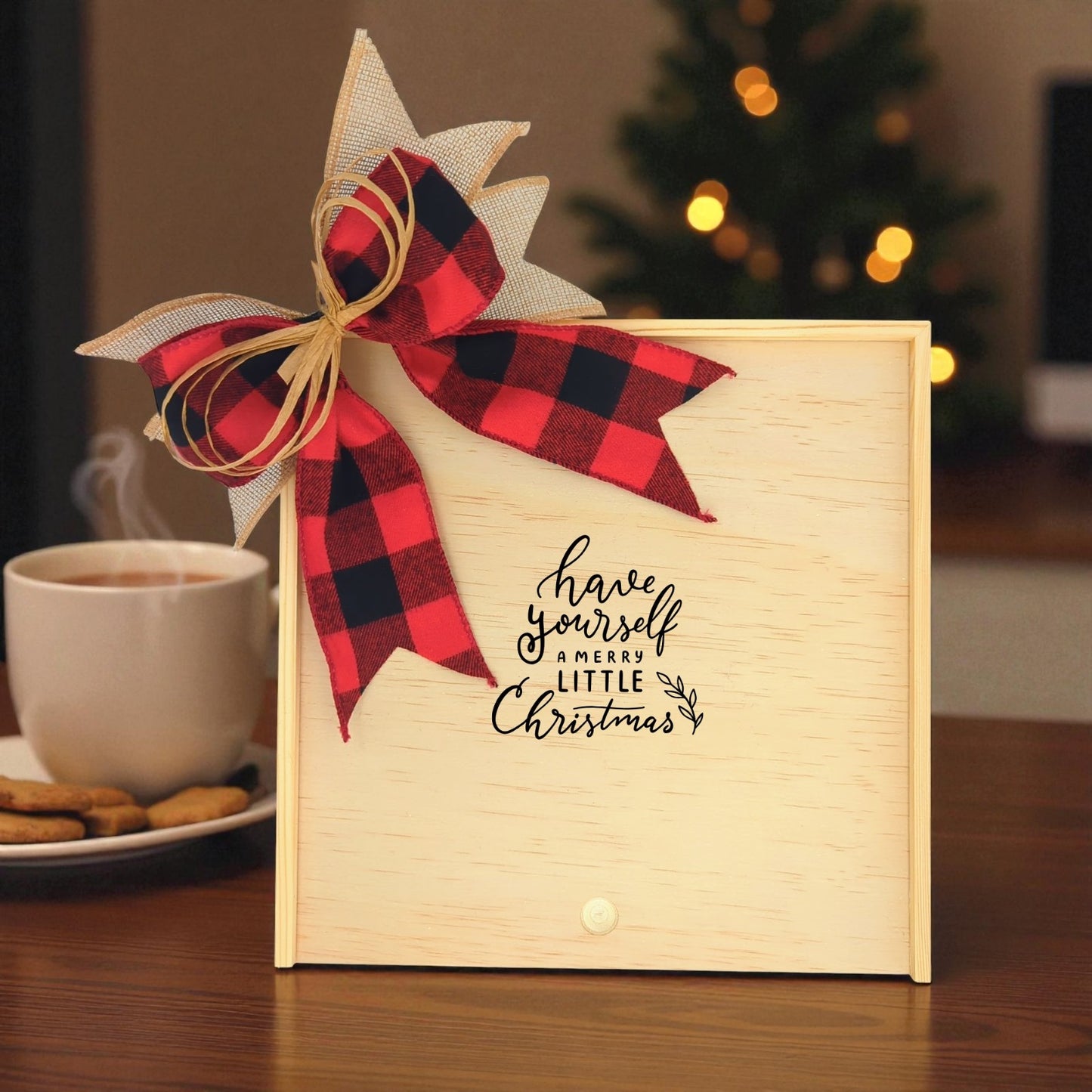Create Your Own Have Yourself a Merry Little Christmas Wood Gift Box with a festive red and black checkered bow, featuring a “Have Yourself a Merry Little Christmas” design, with a warm holiday backdrop including a coffee cup and Christmas tree.