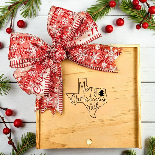 Create Your Own Merry Christmas Y’all Wood Gift Box with a festive red snowflake bow and a “Merry Christmas Y’all” design, surrounded by holiday greenery and berries.