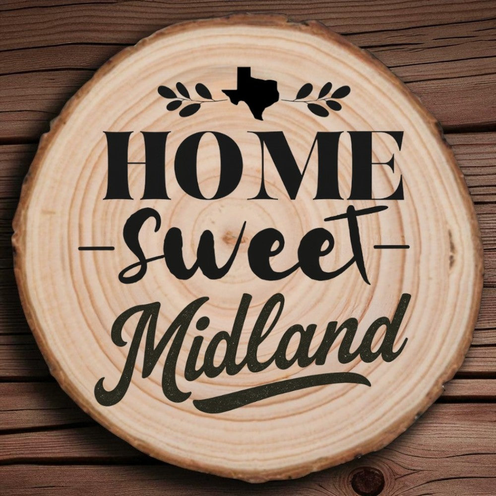 Rustic wood slice coaster with “Home Sweet Midland” laser engraving, Texas silhouette, and leafy accents on wood background.