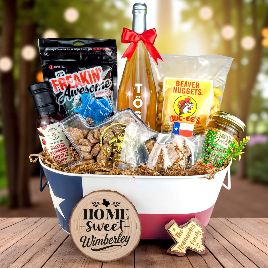 Wimberley Texas Homestyle Toast & Treats basket with TÖST ROSÉ, Peach Pepper Jelly, Buc-ee’s Beaver Nuggets, Texas pecans, praline, chipotle sauce, and Texas flag tin