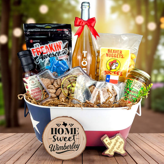Wimberley Texas Homestyle Toast & Treats basket with TÖST ROSÉ, Peach Pepper Jelly, Buc-ee’s Beaver Nuggets, Texas pecans, praline, chipotle sauce, and Texas flag tin