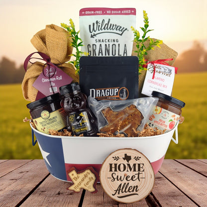 Allen Home Breakfast Basket displayed in a Texas-themed tin, filled with pecan coffee, cinnamon roll mix, jalapeño cornbread mix, granola, honey, praline, and preserves.