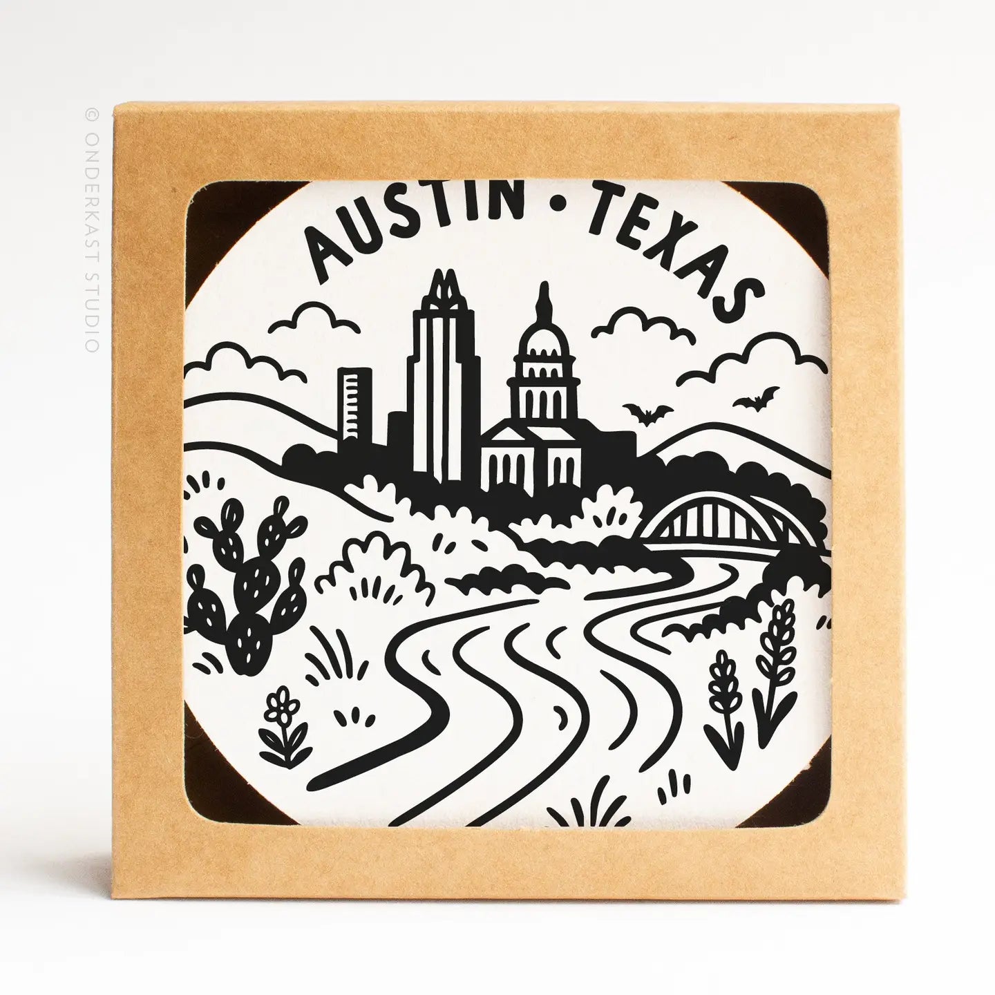 Austin Texas skyline letterpress coaster set featuring the Austin city skyline, styled as a Texas-themed home gift on the Texas Gift Baskets storefront