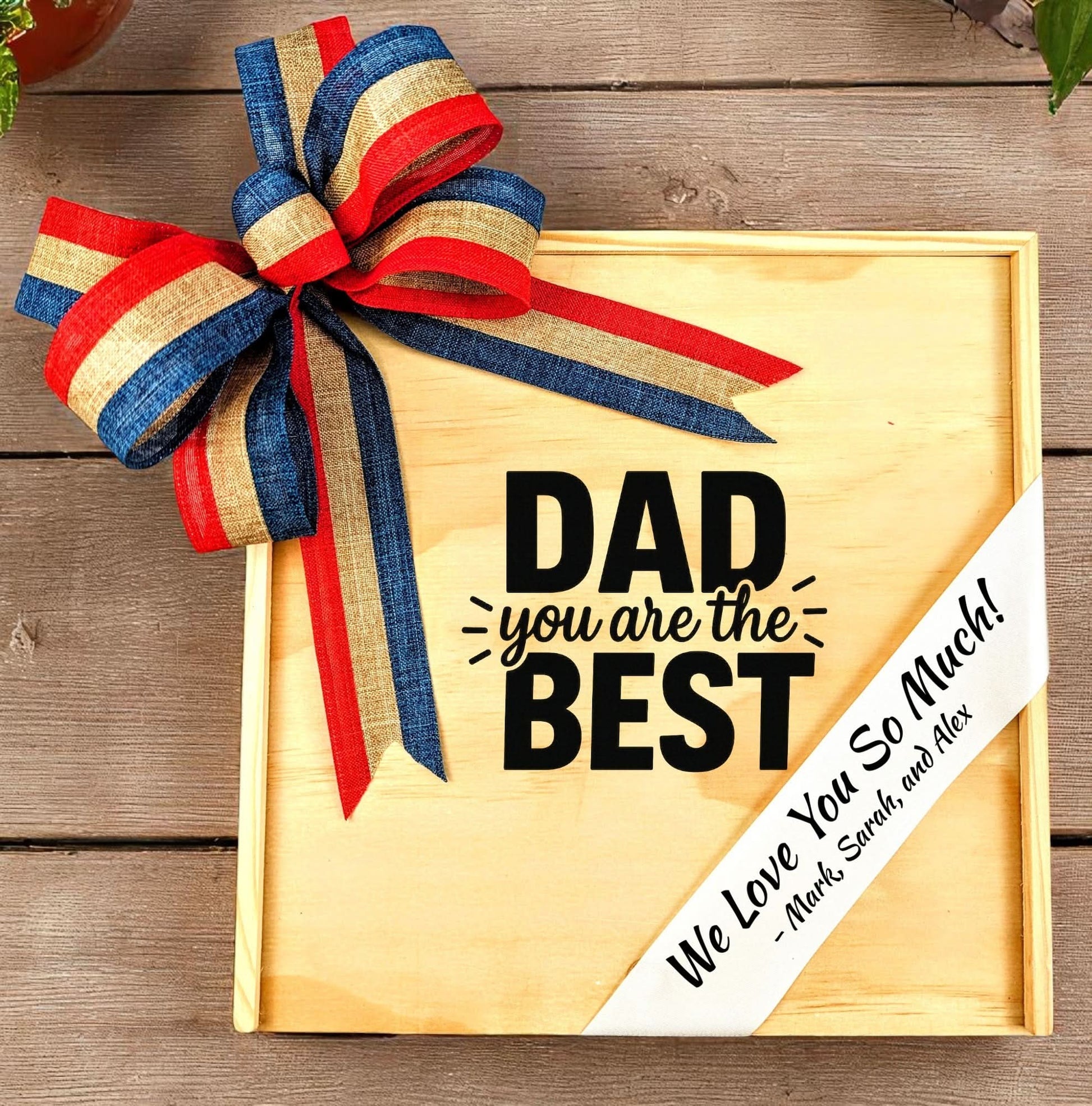 Engraved wooden keepsake gift box for Dad with Dad You Are the Best design, striped ribbon bow, and personalized love message.
