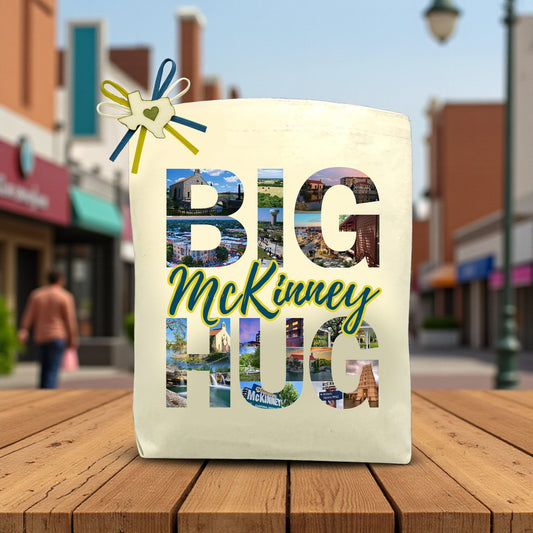 Canvas tote bag with the phrase “Big McKinney Hug,” styled with a Texas-themed design, perfect for filling with customizable snacks, treats, and thoughtful gifts.