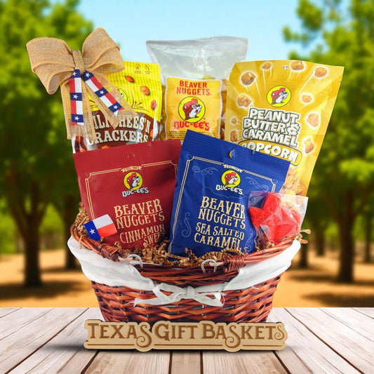 a willow gift basket with white liner filled with five buc-ees snack products