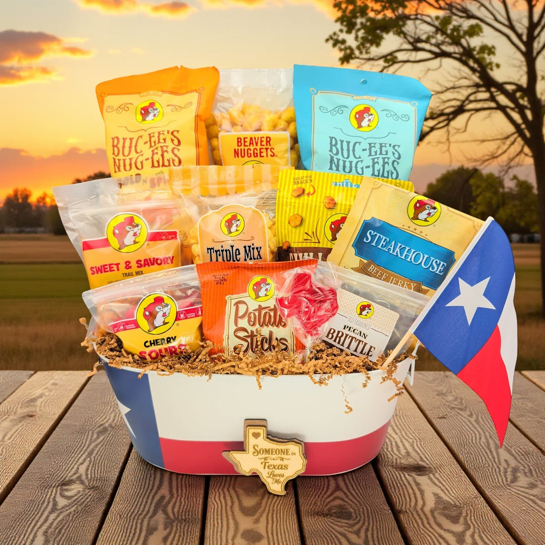 Buc-ee's snack gift bucket overflowing with Beaver Nuggets and Texas snacks