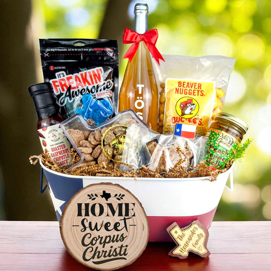 Corpus Christi Texas Home Toast & Treats Basket with TÖST ROSÉ, Peach Pepper Jelly, Buc-ee’s Beaver Nuggets, Texas pecans, praline, chipotle sauce, and Texas flag tin