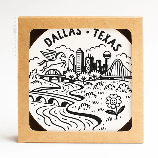 Dallas Texas skyline letterpress coaster set featuring the Dallas city skyline, styled as a Texas-themed home gift on the Texas Gift Baskets storefront