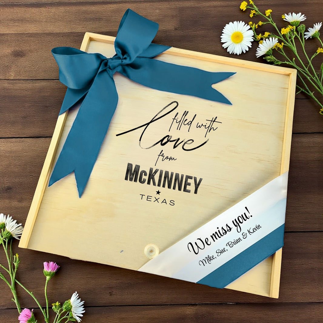 Wooden gift box with the phrase “Filled With Love from McKinney,” designed for filling with customizable Texas snacks, artisan treats, and thoughtful extras.
