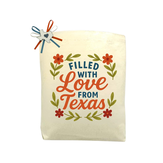 Filled With Love from Texas Blooming Edition canvas tote bag with floral Texas-inspired design, perfect for gifting or daily use