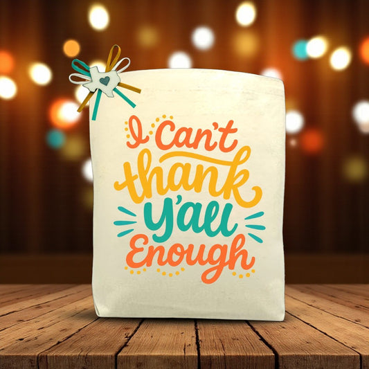 Canvas tote bag with the phrase “I Can’t Thank Y’all Enough,” designed for filling with customizable Texas snacks, treats, and thoughtful gifts.