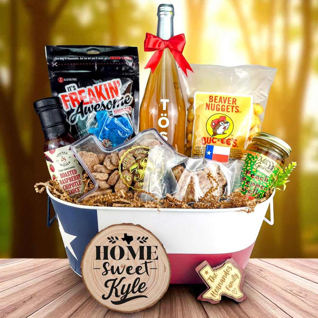 Kyle Texas Toast & Treats Home Basket with TÖST ROSÉ, Peach Pepper Jelly, Buc-ee’s Beaver Nuggets, Texas pecans, praline, chipotle sauce, and Texas flag tin