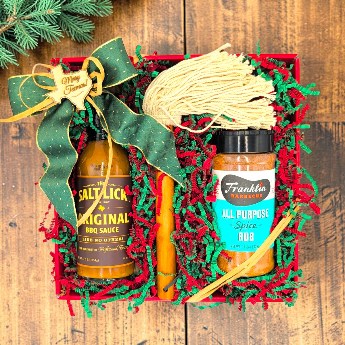 Merry Texmas BBQ Trio holiday gift tray with Salt Lick Original Sauce, Franklin All-Purpose Seasoning and a BBQ mop