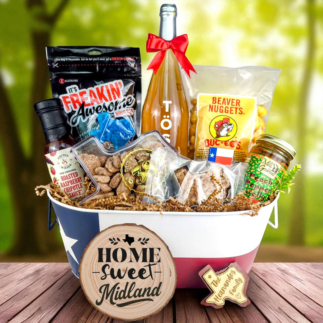 Midland Texas Family Home Toast & Treats basket with TÖST ROSÉ, Peach Pepper Jelly, Buc-ee’s Beaver Nuggets, Texas pecans, praline, chipotle sauce, and Texas flag tin