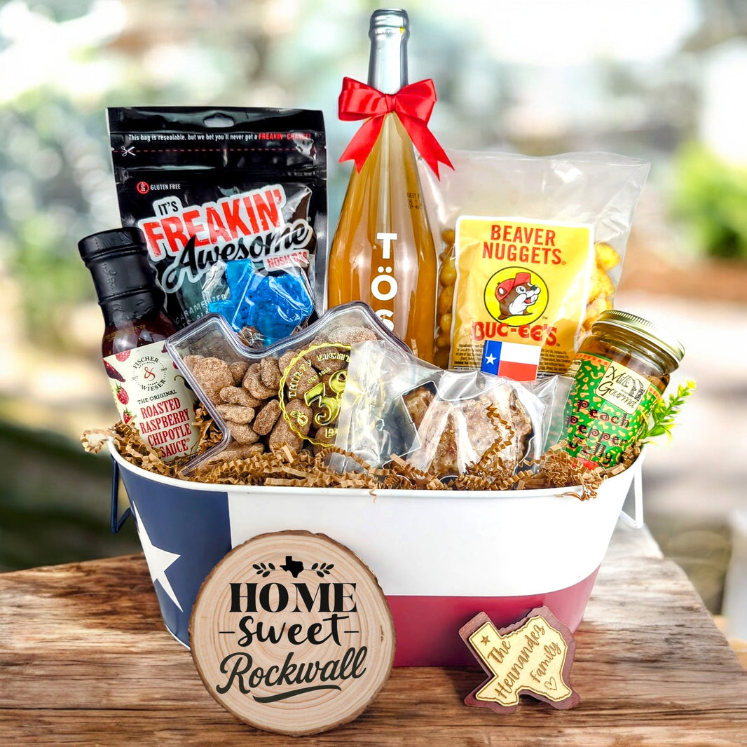 Rockwall Texas Toast & Treats Home Basket with TÖST ROSÉ, Peach Pepper Jelly, Buc-ee’s Beaver Nuggets, Texas pecans, praline, chipotle sauce, and Texas flag tin