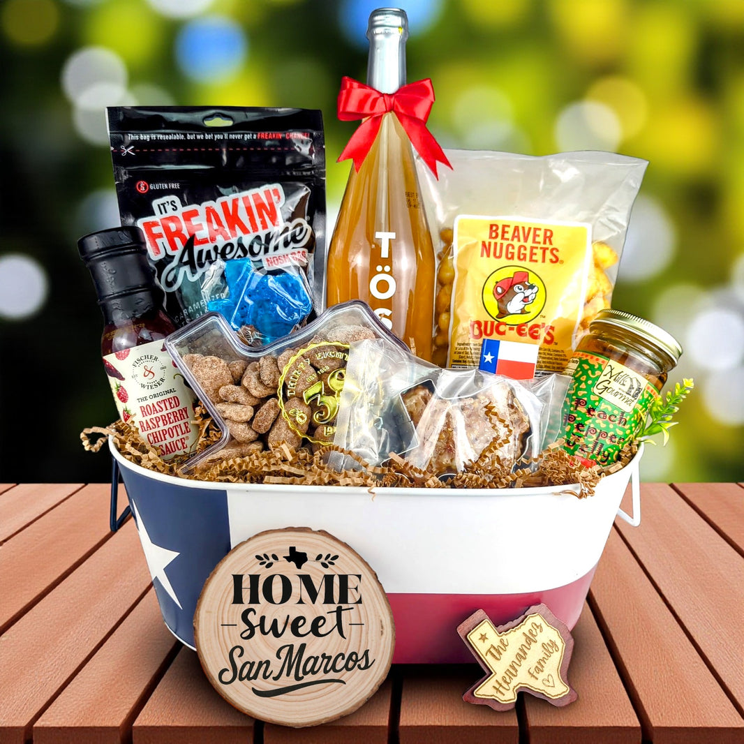 San Marcos Texas Toast & Treats Home Basket with TÖST ROSÉ, Peach Pepper Jelly, Buc-ee’s Beaver Nuggets, Texas pecans, praline, chipotle sauce, and Texas flag tin