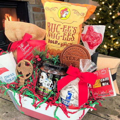 Angled view of Texas Christmas Comforts with chili and cornbread mixes, salsa, snacks and Texas keepsakes