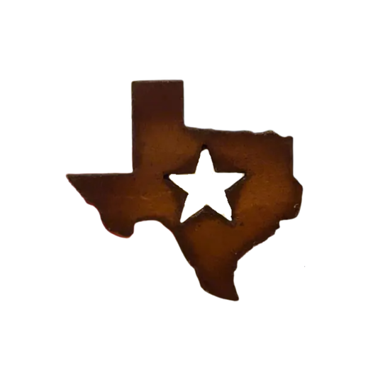 a rustic metal magnet in the shape of texas with the texas star cut out from the center