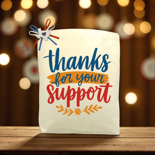 Canvas tote bag with the phrase “Thanks for Your Support,” designed for filling with customizable Texas snacks, artisan treats, and thoughtful extras.