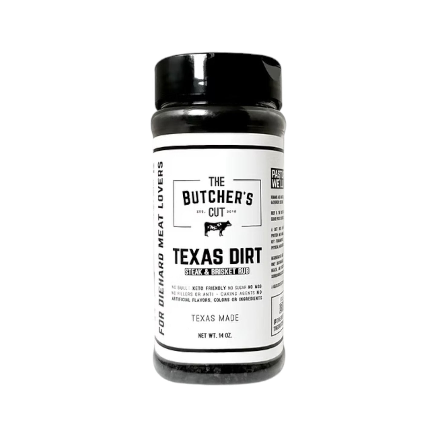 Bottle of The Butcher’s Cut Texas Dirt steak and brisket rub with a black lid and white label, featuring bold black typography, a cow icon, and text indicating Texas-made seasoning, photographed on a white background