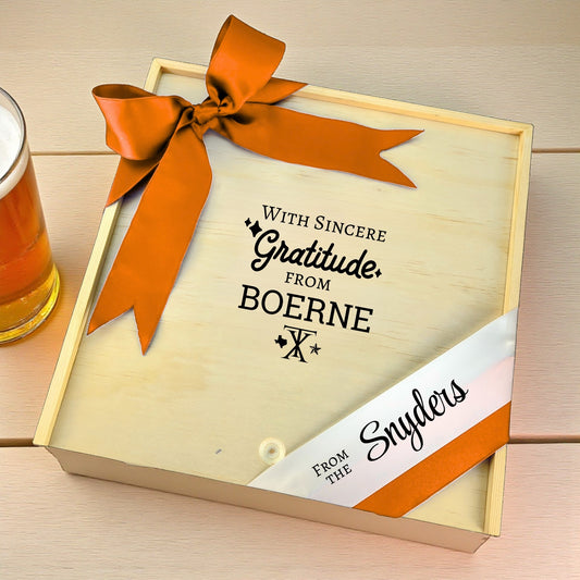 Wooden gift box with the phrase “With Sincere Gratitude from Boerne,” designed for filling with customizable Texas snacks, artisan treats, and thoughtful extras.