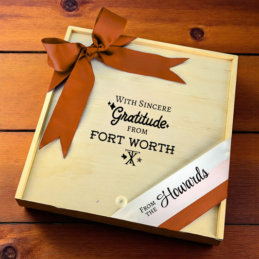 Wooden gift box with the phrase “With Sincere Gratitude from Fort Worth,” designed for filling with customizable Texas snacks, artisan treats, and thoughtful extras.