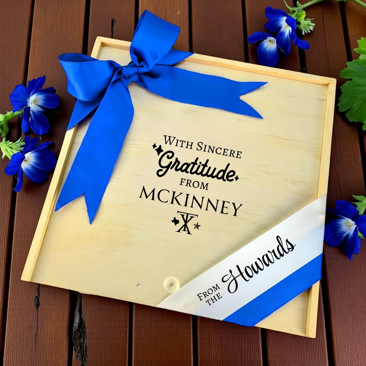 Gift box with the phrase “With Sincere Gratitude From McKinney,” designed for filling with customizable Texas snacks, artisan treats, and thoughtful extras.