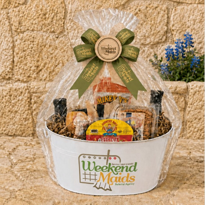 Branded Texas favorites gift basket in a printed tub with Weekend Maids logo ribbon